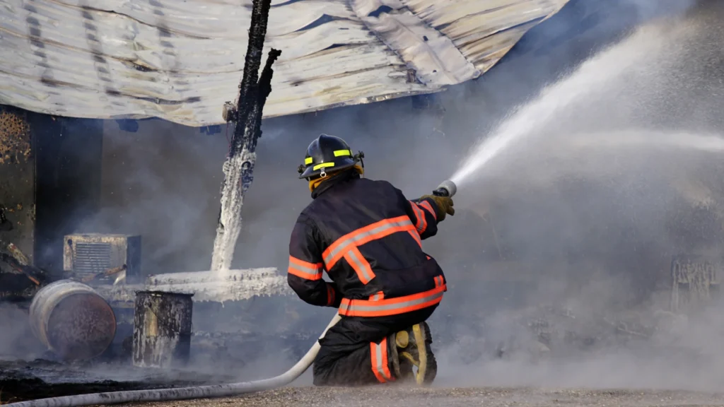 fire fighter putting out blaze